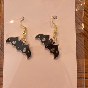 “Black Bat” earrings.